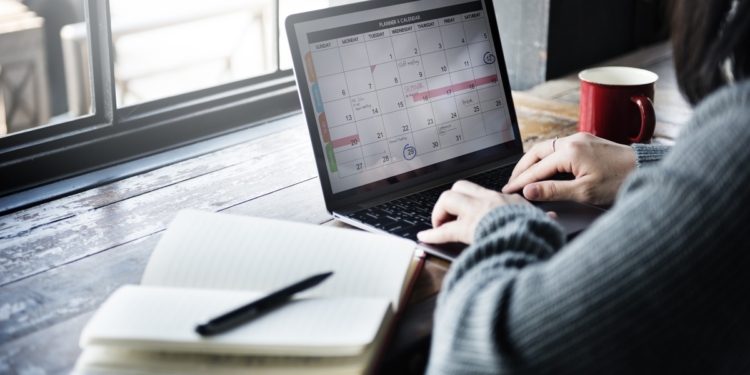 Schedule planning using computer and notebook