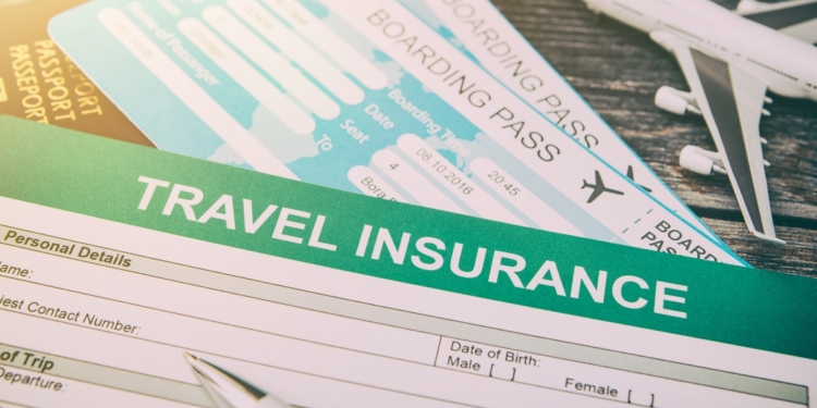 Insurance application form, boarding pass and airplane